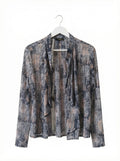 Blusa tipo cardigan abierto estampado Ayres